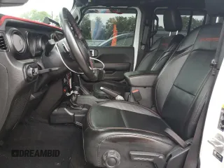 2022 Jeep Gladiator Rubicon with VIN 1C6JJTBG5NL152818, listed as a Copart auction lot 80095554 with 9,579 mi miles and Salvage title. Bid and sale history available at DreamBid. Image 7.