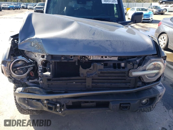 2023 Ford Bronco z VIN 1FMEE5DP0PLB62405, wystawiony jako Copart lot #48457335 z przebiegiem 56 998 mil mil oraz Szkoda całkowita • Salvage title. Historia ofert i sprzedaży dostępna na DreamBid. Obrazek 12.