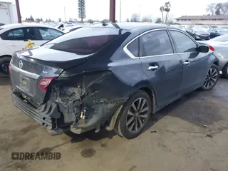 2018 Nissan Altima SR with VIN 1N4AL3AP8JC275968, listed as a IAAI auction lot 41563010 with 160,467 mi miles and . Bid and sale history available at DreamBid. Image 4.