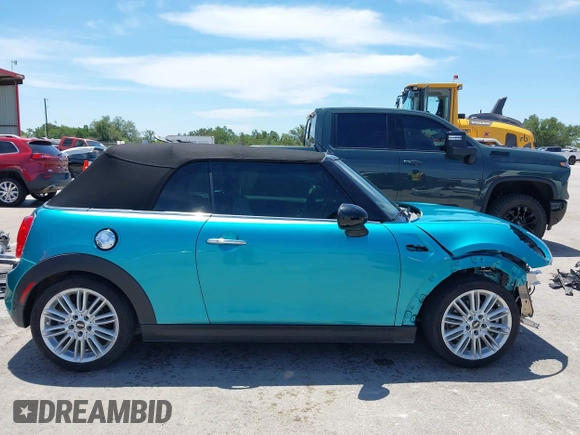 2017 MINI Convertible Cooper S z VIN WMWWG9C30H3C80917, wystawiony jako IAAI lot #42227320 z przebiegiem 38 490 mil mil oraz . Historia ofert i sprzedaży dostępna na DreamBid. Obrazek 14.