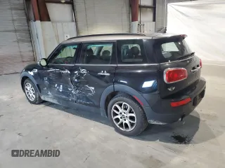 2017 MINI Clubman Cooper with VIN WMWLU1C55H2F26865, listed as a Copart auction lot 75981404 with 98,979 mi miles and Salvage Title. Bid and sale history available at carsss.com. Image 2.