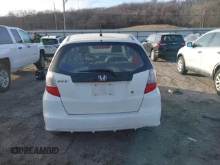 2009 Honda Fit z VIN JHMGE88249S067463, wystawiony jako IAAI lot #41354698 z przebiegiem 153 402 mil mil oraz . Historia ofert i sprzedaży dostępna na DreamBid. Obrazek 16.