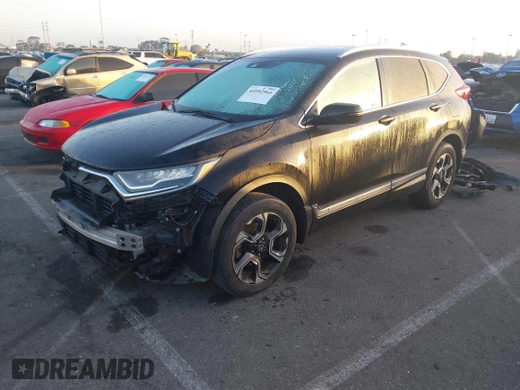 2019 Honda CR-V Touring with VIN 7FARW2H9XKE012394, listed as a IAAI auction lot 41092564 with 49,527 mi miles and . Bid and sale history available at DreamBid. Image 17.