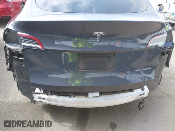 2022 Tesla Model Y Long Range z VIN 7SAYGDEE6NF364994, wystawiony jako IAAI lot #42322587 z przebiegiem 41 572 mil mil oraz . Historia ofert i sprzedaży dostępna na DreamBid. Obrazek 6.