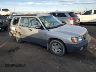 1999 Subaru Forester L with VIN JF1SF6355XG739180, listed as a Copart auction lot 84467674 with 127,591 mi miles and Salvage Title. Bid and sale history available at carsss.com. Image 4.