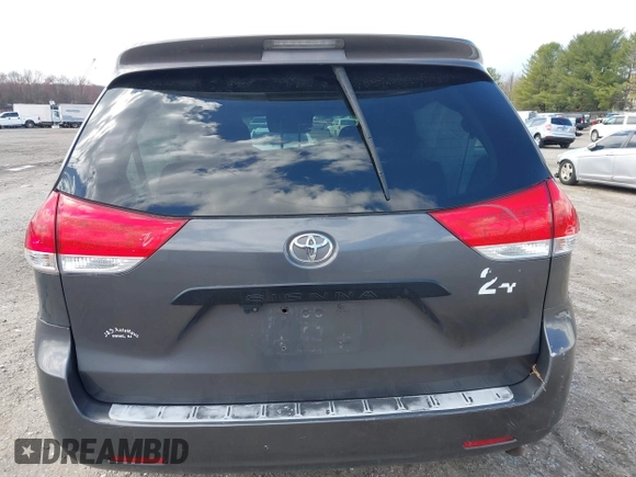 2014 Toyota Sienna L with VIN 5TDZK3DC4ES407928, listed as a IAAI auction lot 41887349 with 208,289 mi miles. Bid and sale history available at carsss.com. Image 16.