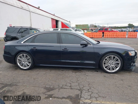 2017 Audi A8 L Sport with VIN WAU43AFD1HN007334, listed as a IAAI auction lot 41760035 with 67,342 mi miles. Bid and sale history available at carsss.com. Image 13.