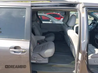 2015 Toyota Sienna XLE with VIN 5TDYK3DC9FS685768, listed as a IAAI auction lot 42062942 with 132,242 mi miles. Bid and sale history available at carsss.com. Image 8.