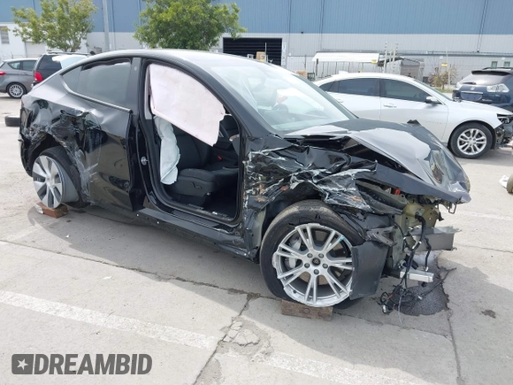 2023 Tesla Model Y Long Range with VIN 7SAYGDEE1PF748426, listed as a IAAI auction lot 41839308 with 26,633 mi miles and . Bid and sale history available at carsss.com. Image 1.