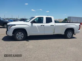2022 Toyota Tundra with VIN 5TFKB5CDXNX001458, listed as a IAAI auction lot 42640278 with 51,718 mi miles and . Bid and sale history available at DreamBid. Image 14.