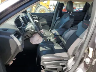2017 Jeep Cherokee Trailhawk with VIN 1C4PJMBSXHW600230, listed as a Copart auction lot 55606665 with Not provided miles and Salvage title. Bid and sale history available at DreamBid. Image 7.