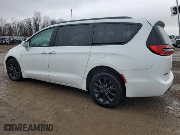 2021 Chrysler Pacifica Touring L with VIN 2C4RC3BG3MR525690, listed as a Copart auction lot 83658704 with 51,389 mi miles and Salvage title. Bid and sale history available at DreamBid. Image 2.