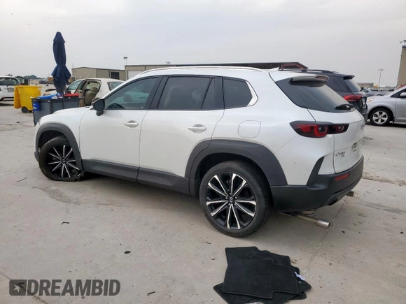 2023 Mazda CX-50 S Premium Plus with VIN 7MMVABEM3PN131818, listed as a Copart auction lot 57358595 with 61,179 mi miles and Clean title. Bid and sale history available at DreamBid. Image 2.
