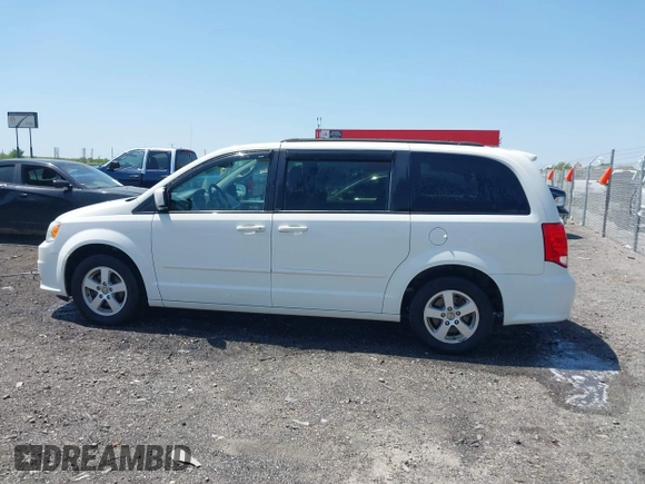 2012 Dodge Grand Caravan SXT with VIN 2C4RDGCG9CR200432, listed as a IAAI auction lot 42027477 with 99,076 mi miles and . Bid and sale history available at DreamBid. Image 14.