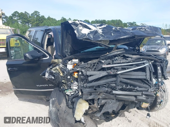 2019 GMC Yukon XL SLT with VIN 1GKS2GKCXKR359166, listed as a IAAI auction lot 40546837 with Not provided miles and . Bid and sale history available at DreamBid. Image 6.