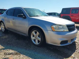 2013 Dodge Avenger SE with VIN 1C3CDZAB0DN519231, listed as a IAAI auction lot 41981579 with 215,262 mi miles. Bid and sale history available at carsss.com. Image 1.