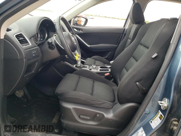 2016 Mazda CX-5 Touring with VIN JM3KE2CY4G0882671, listed as a Copart auction lot 51089555 with 50,951 mi miles and Salvage Title. Bid and sale history available at carsss.com. Image 7.