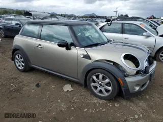 2009 MINI Cooper Hardtop with VIN WMWMF33559TW70189, listed as a Copart auction lot 51461365 with 146,700 mi miles and Salvage Title. Bid and sale history available at carsss.com. Image 4.