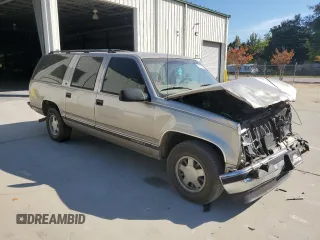 1999 GMC Suburban with VIN 3GKEC16R7XG542862, listed as a Copart auction lot 77568734 with 251,717 mi miles and Salvage Title. Bid and sale history available at carsss.com. Image 4.