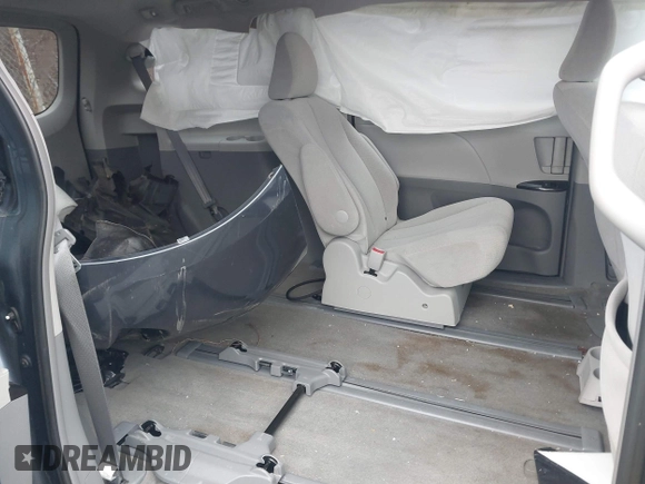 2013 Toyota Sienna LE with VIN 5TDJK3DC8DS064035, listed as a IAAI auction lot 41909785 with 135,716 mi miles and . Bid and sale history available at DreamBid. Image 8.