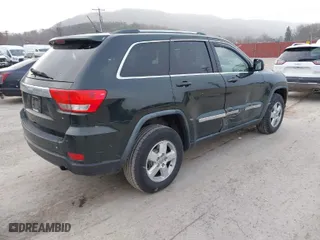 2011 Jeep Grand Cherokee Laredo with VIN 1J4RR4GG9BC546198, listed as a IAAI auction lot 41879387 with 190,973 mi miles. Bid and sale history available at carsss.com. Image 4.