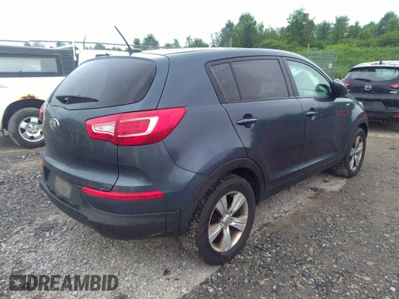 2013 Kia Sportage LX z VIN KNDPBCA20D7380903, wystawiony jako IAAI lot #42577970 z przebiegiem 112 689 mil mil oraz . Historia ofert i sprzedaży dostępna na DreamBid. Obrazek 4.