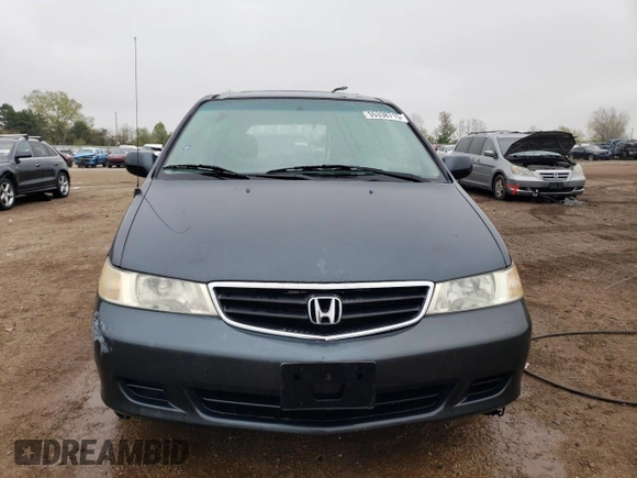 2004 Honda Odyssey EX-L z VIN 5FNRL18924B040028, wystawiony jako Copart lot #55338715 z przebiegiem 242 055 mil mil oraz Szkoda całkowita • Salvage title. Historia ofert i sprzedaży dostępna na DreamBid. Obrazek 5.