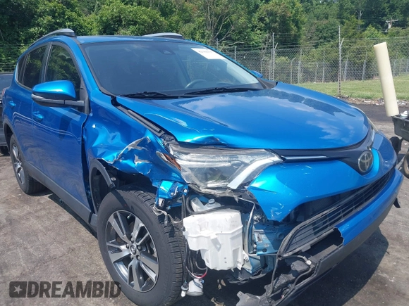 2018 Toyota RAV4 XLE with VIN JTMWFREVXJJ751586, listed as a IAAI auction lot 42586337 with 55,821 mi miles and . Bid and sale history available at DreamBid. Image 6.