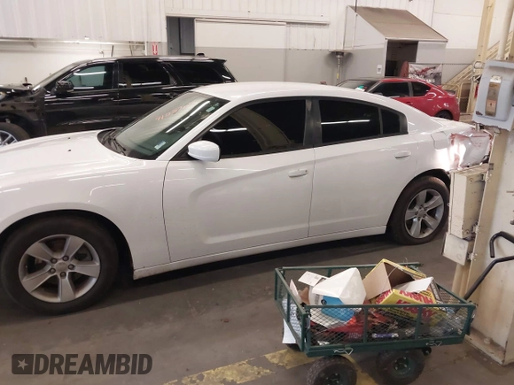 2013 Dodge Charger SE z VIN 2C3CDXBG9DH520241, wystawiony jako IAAI lot #41057114 z przebiegiem 148 768 mil mil oraz . Historia ofert i sprzedaży dostępna na DreamBid. Obrazek 15.