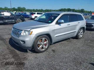 2011 Jeep Grand Cherokee Overland Summit with VIN 1J4RR6GT9BC535985, listed as a IAAI auction lot 42556913 with 108,845 mi miles and . Bid and sale history available at DreamBid. Image 2.