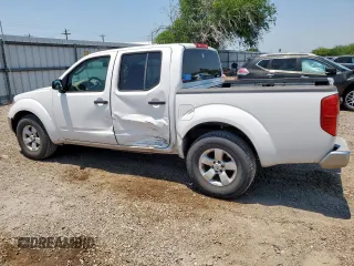 2009 Nissan Frontier SE with VIN 1N6AD07U29C400846, listed as a Copart auction lot 56419735 with 143,005 mi miles and Salvage title. Bid and sale history available at DreamBid. Image 2.