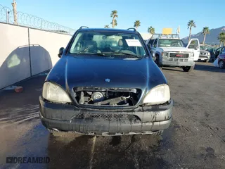 2001 Mercedes-Benz M-Class with VIN 4JGAB72E01A251463, listed as a IAAI auction lot 41392480 with 1 mi miles. Bid and sale history available at carsss.com. Image 6.