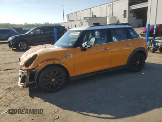 2016 MINI Hardtop 4 Door with VIN WMWXU1C51G2E16685, listed as a Copart auction lot 63425225 with 117,597 mi miles and Salvage title. Bid and sale history available at DreamBid. Image 1.