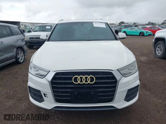 2016 Audi Q3 Premium Plus with VIN WA1BFCFS0GR009654, listed as a IAAI auction lot 42141372 with 138,992 mi miles. Bid and sale history available at carsss.com. Image 12.