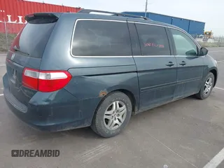 2005 Honda Odyssey EX with VIN 5FNRL38465B108123, listed as a IAAI auction lot 41961270 with 169,948 mi miles. Bid and sale history available at carsss.com. Image 4.