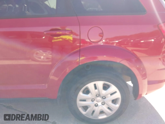 2015 Dodge Journey SE z VIN 3C4PDCAB5FT679585, wystawiony jako IAAI lot #42090600 z przebiegiem 166 876 mil mil oraz . Historia ofert i sprzedaży dostępna na DreamBid. Obrazek 6.