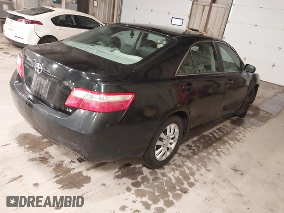 2009 Toyota Camry with VIN 4T1BE46K39U338519, listed as a IAAI auction lot 41940726 with 186,356 mi miles. Bid and sale history available at carsss.com. Image 4.