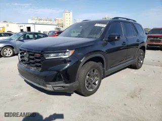 2023 Honda Pilot TrailSport with VIN 5FNYG1H66PB058087, listed as a Copart auction lot 84754824 with 26,278 mi miles and Salvage Title. Bid and sale history available at carsss.com. Image 1.