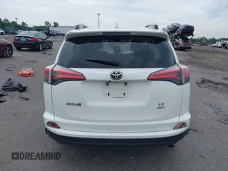 2018 Toyota RAV4 LE with VIN JTMBFREV6JJ210226, listed as a IAAI auction lot 42700312 with Not provided miles and . Bid and sale history available at DreamBid. Image 17.