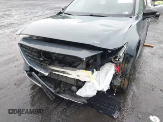 2021 Mazda CX-9 Grand Touring z VIN JM3TCBDY8M0528365, wystawiony jako IAAI lot #42222394 z przebiegiem 44 850 mil mil oraz . Historia ofert i sprzedaży dostępna na DreamBid. Obrazek 6.