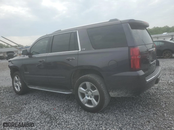 2015 Chevrolet Tahoe LTZ with VIN 1GNSCCKC8FR628330, listed as a Copart auction lot 54561835 with 212,503 mi miles and Salvage Title. Bid and sale history available at carsss.com. Image 2.