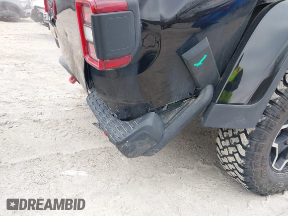 2022 Jeep Gladiator Rubicon with VIN 1C6JJTBG7NL145501, listed as a IAAI auction lot 41506842 with 20,593 mi miles and . Bid and sale history available at DreamBid. Image 18.