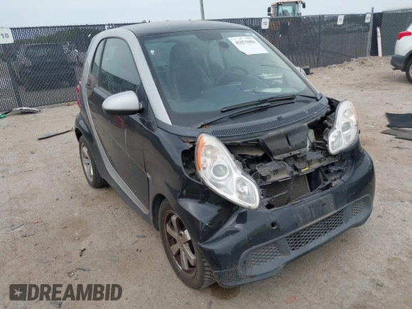 2013 Smart fortwo Pure with VIN WMEEJ3BA5DK620493, listed as a IAAI auction lot 42071086 with 85,883 mi miles and . Bid and sale history available at DreamBid. Image 1.