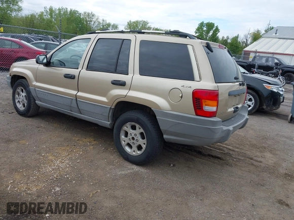 2000 Jeep Grand Cherokee Laredo with VIN 1J4GW48SXYC100248, listed as a IAAI auction lot 42182318 with 227,658 mi miles and . Bid and sale history available at DreamBid. Image 3.