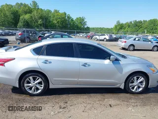 2015 Nissan Altima 2.5 z VIN 1N4AL3AP2FC591986, wystawiony jako IAAI lot #42172883 z przebiegiem 205 419 mil mil oraz . Historia ofert i sprzedaży dostępna na DreamBid. Obrazek 13.