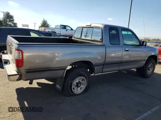 1995 Toyota T100 z VIN JT4VD22FXS0007824, wystawiony jako Copart lot #79159804 z przebiegiem 89 139 mil mil oraz Szkoda całkowita • Salvage title. Historia ofert i sprzedaży dostępna na DreamBid. Obrazek 3.