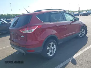 2014 Ford Escape SE z VIN 1FMCU0GX2EUB91517, wystawiony jako IAAI lot #42231093 z przebiegiem 67 436 mil mil oraz . Historia ofert i sprzedaży dostępna na DreamBid. Obrazek 4.