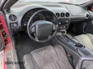 1995 Pontiac Firebird Firebird z VIN 2G2FS22S5S2227060, wystawiony jako Copart lot #64597545 z przebiegiem 106 971 mil mil oraz Szkoda całkowita • Salvage title. Historia ofert i sprzedaży dostępna na DreamBid. Obrazek 8.