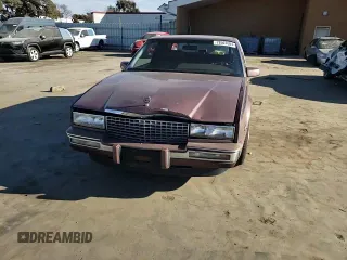 1988 Cadillac Eldorado with VIN 1G6EL1153JU632470, listed as a Copart auction lot 78507684 with 176,894 mi miles and Salvage Title. Bid and sale history available at DreamBid. Image 10.