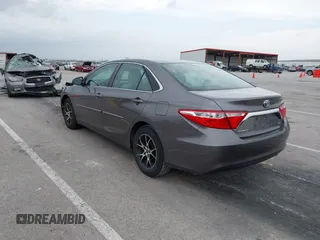 2015 Toyota Camry XLE with VIN 4T4BF1FK5FR483736, listed as a IAAI auction lot 41933106 with 104,468 mi miles. Bid and sale history available at carsss.com. Image 3.